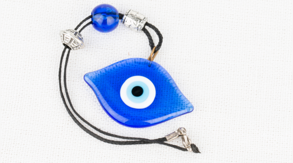A broken Evil Eye amulet, a sign of protection fulfilled.