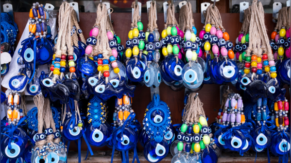 An Evil Eye charm hung in a new home for protection.