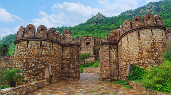 The imposing Bhangarh Fort at twilight in Rajasthan.