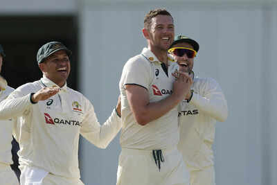 Josh Hazlewood celebrates a crucial wicket against West Indies.