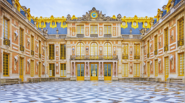 The opulent Palace of Versailles and its sprawling gardens.