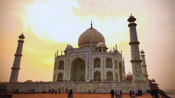 The Taj Mahal gleaming white in the sunlight.