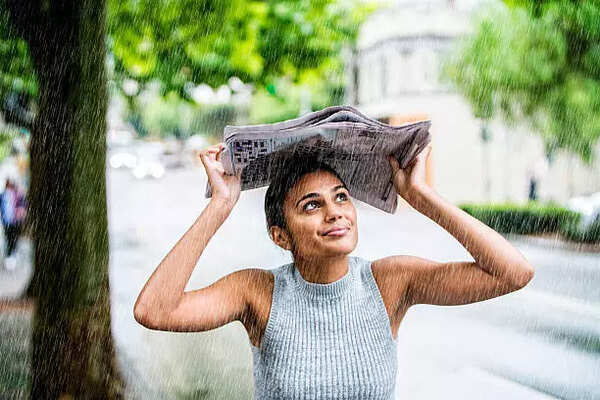 Person drenched in rain